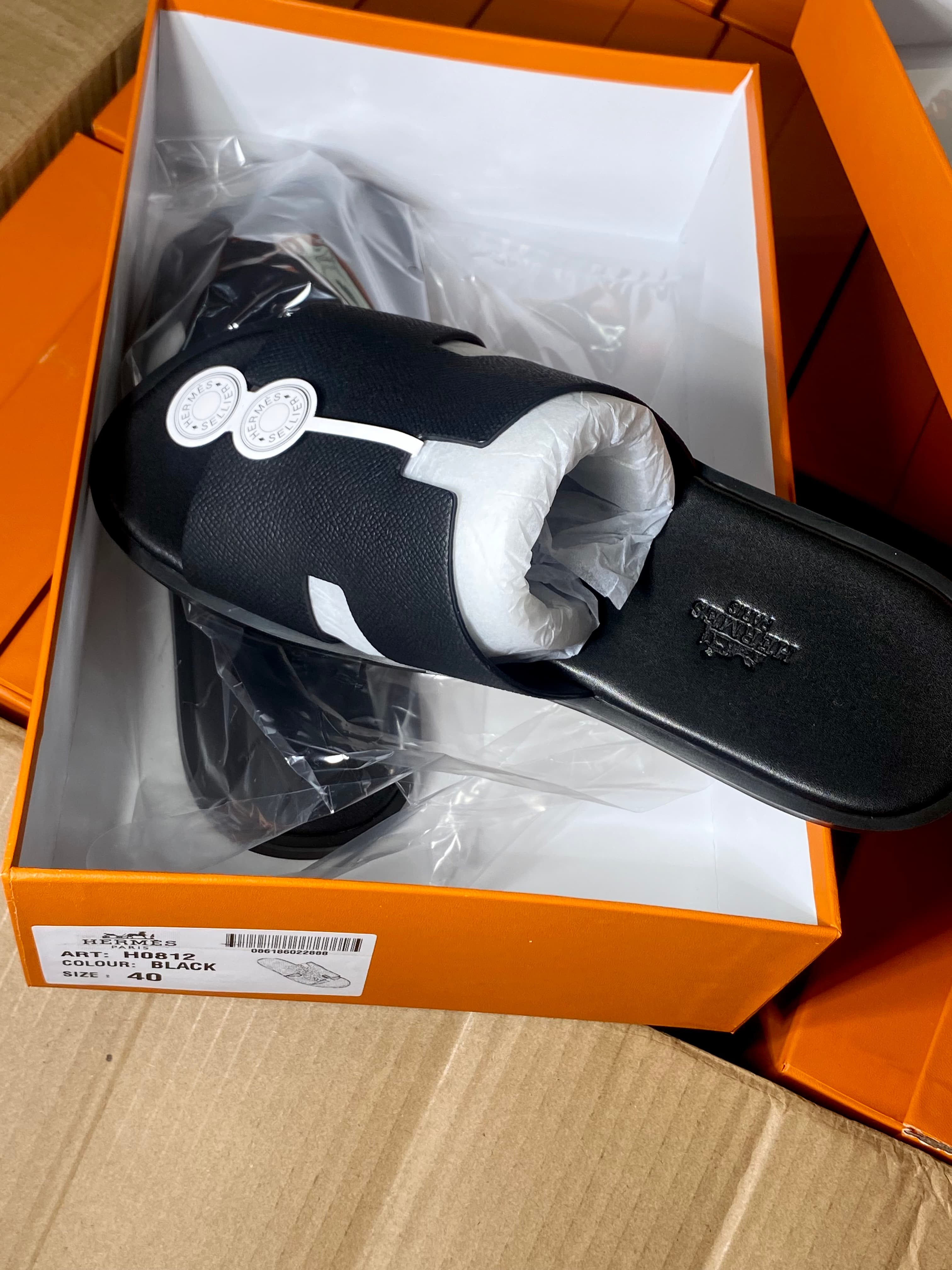 Black Hermes slippers 