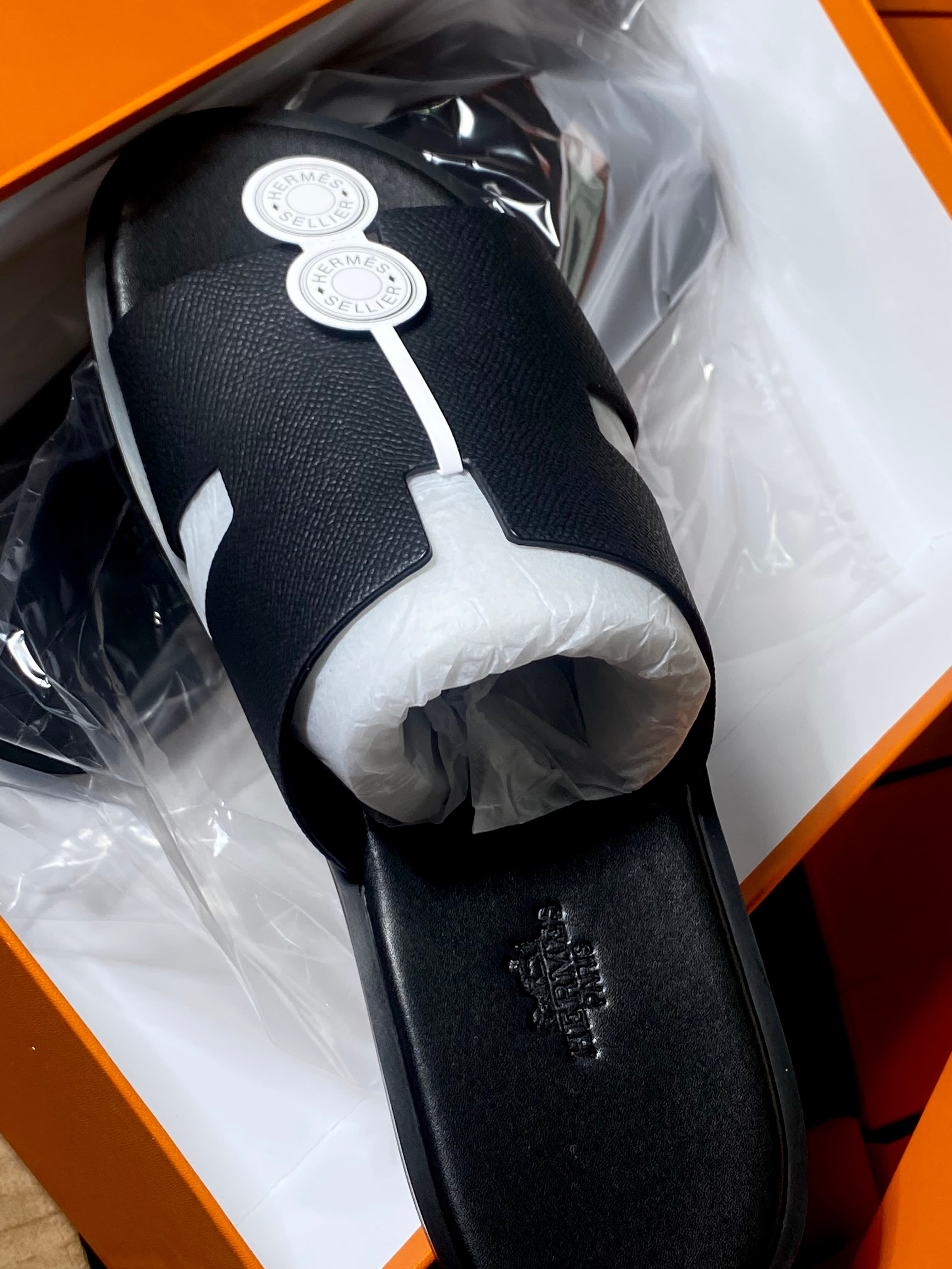 Black Hermes slippers 